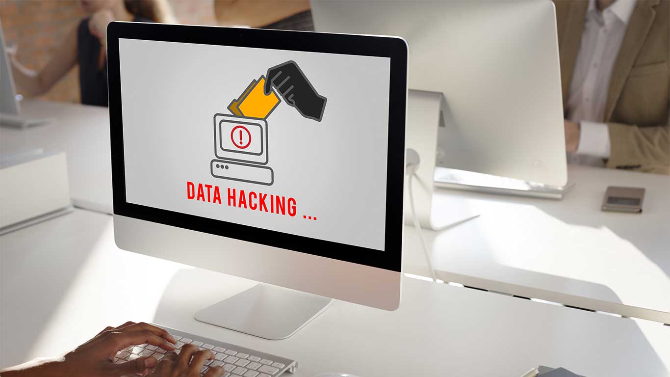 Image d'un ordinateur verrouillé avec un message de rançon affiché, représentant l'attaque de Ransomware, la technique de piratage préférée des hackers